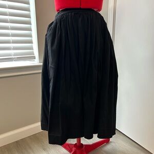 Pinup Girl Clothing black Jenny skirt bottom hem is longer than originally